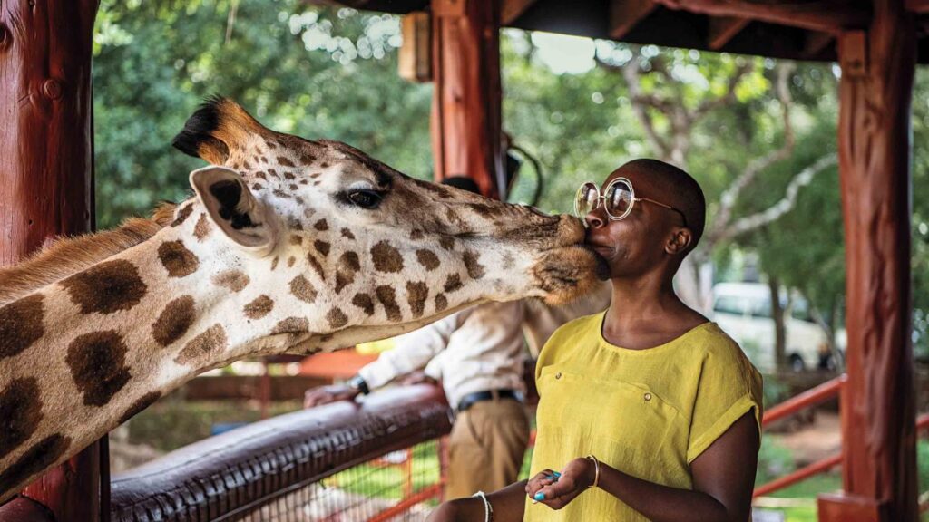 Nabongo with a giraffe