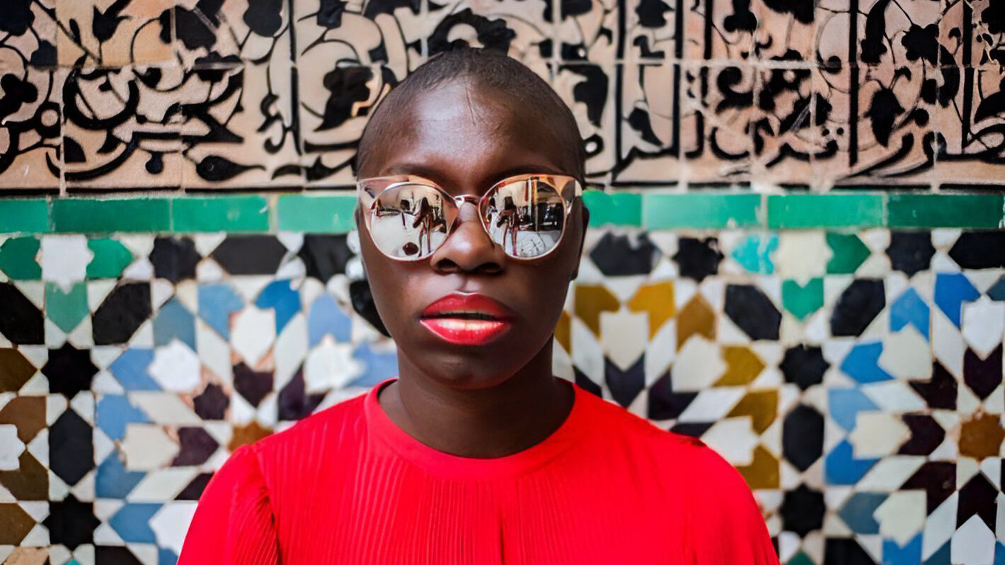 Nabongo in Morocco in her signature look of bold colors and bright lips
