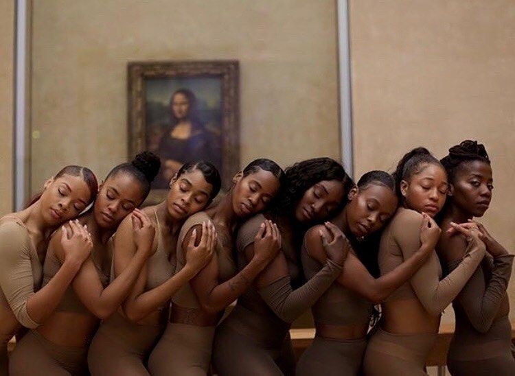 black women holding each other by Loveland Foundation