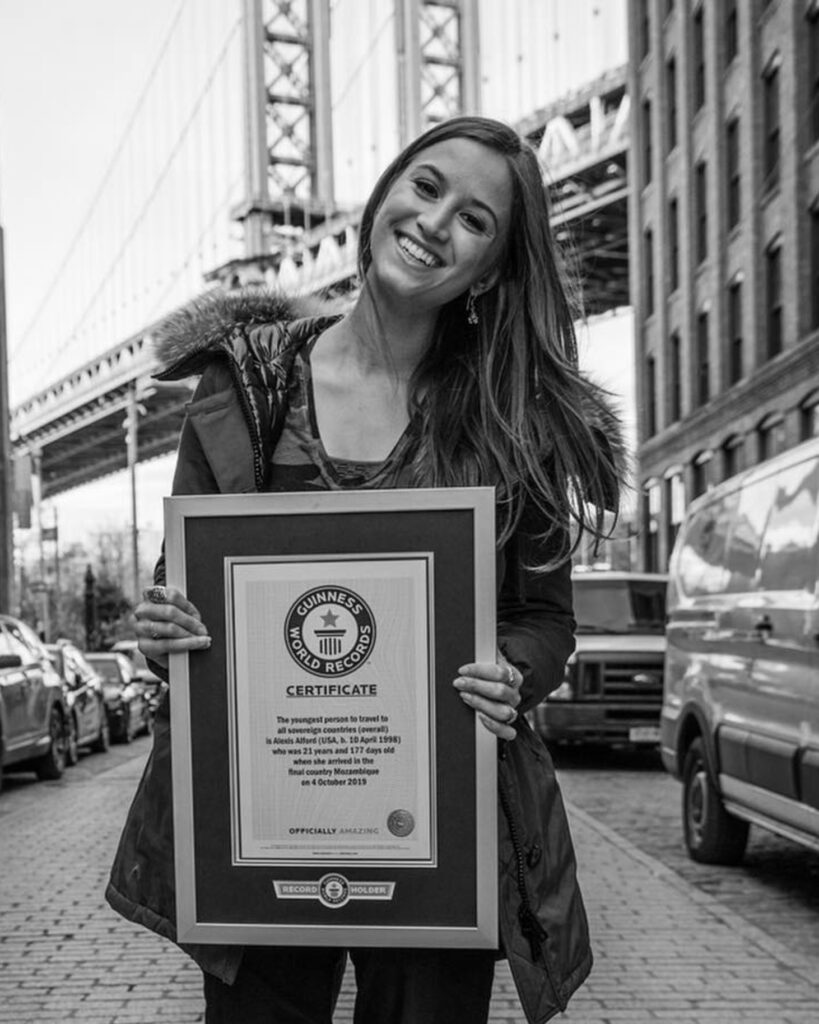 Her childhood dream became a reality as she stepped foot in her last country, Mozambique. Alford with her Guinness World Record. 