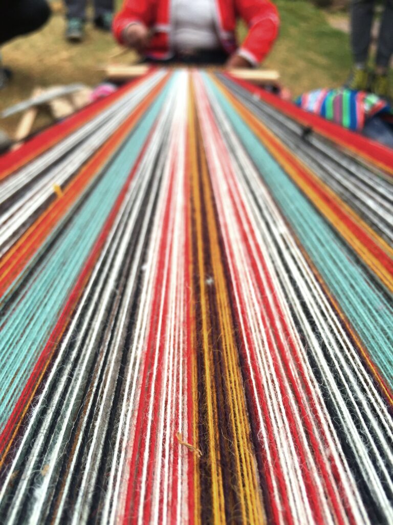 Weaving threads by Awamaki