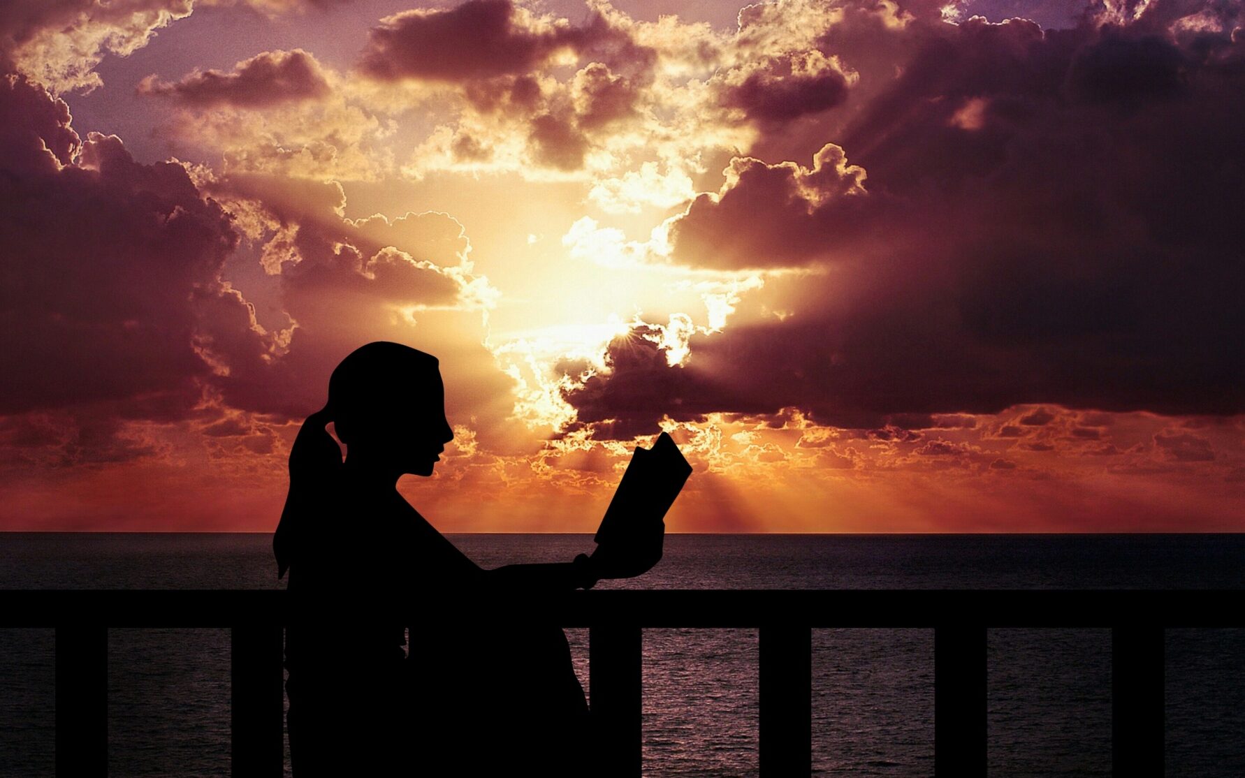 reading woman dusk outside edited 1